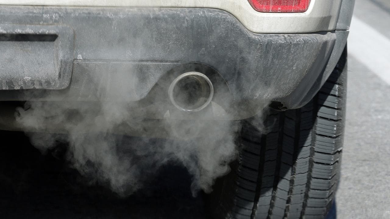 Exhaust comes from the tailpipe of a vehicle.