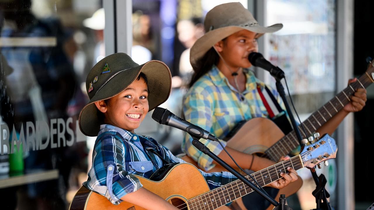Musicians The Curry Mob busking
