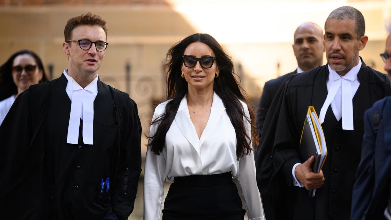 Former ABC journalist Antoinette Lattouf (centre)