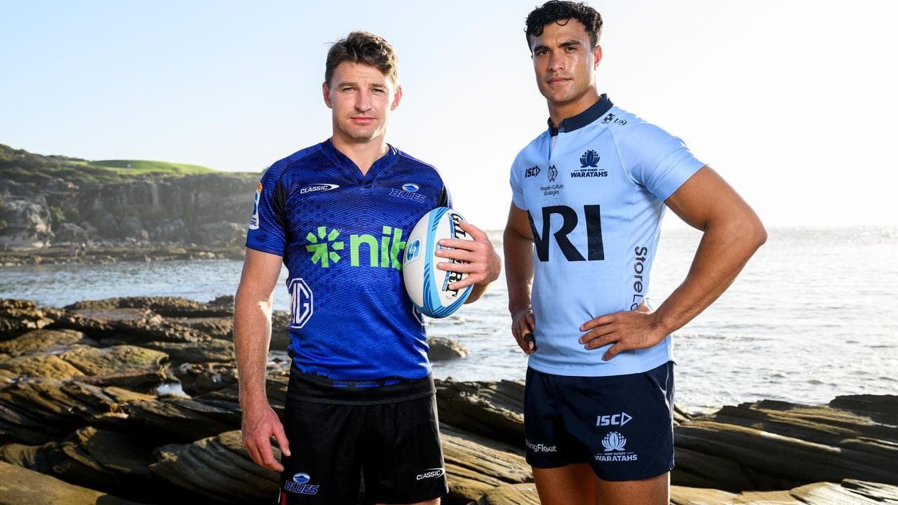 Beauden Barrett of the Blues (left) and Joseph-Aukuso Suaalii.