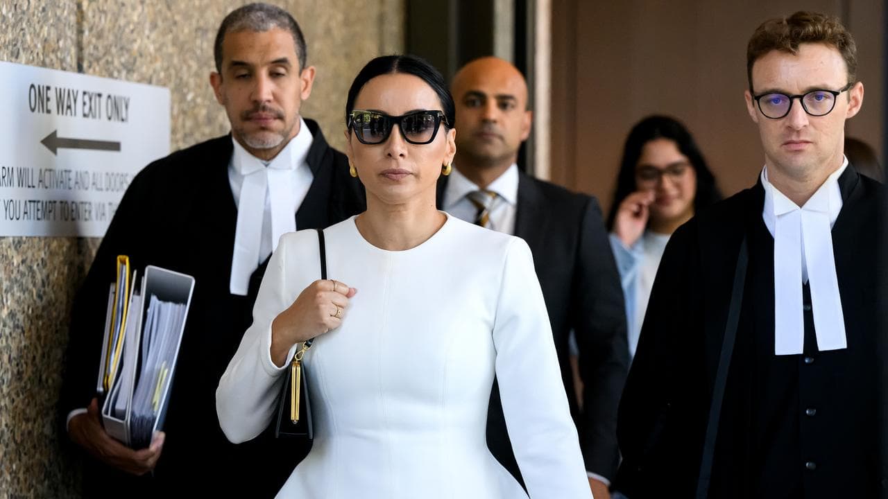 Journalist Antoinette Lattouf (centre) 