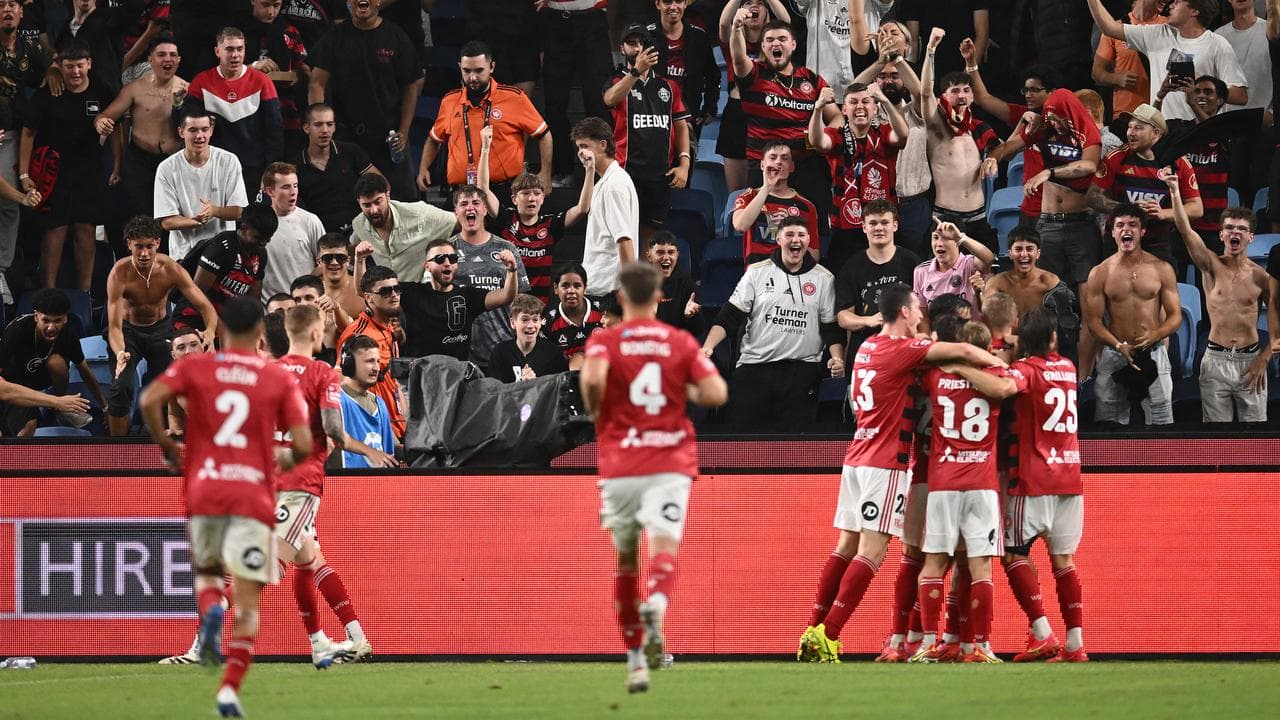 Celebrating Wanderers players and fans.