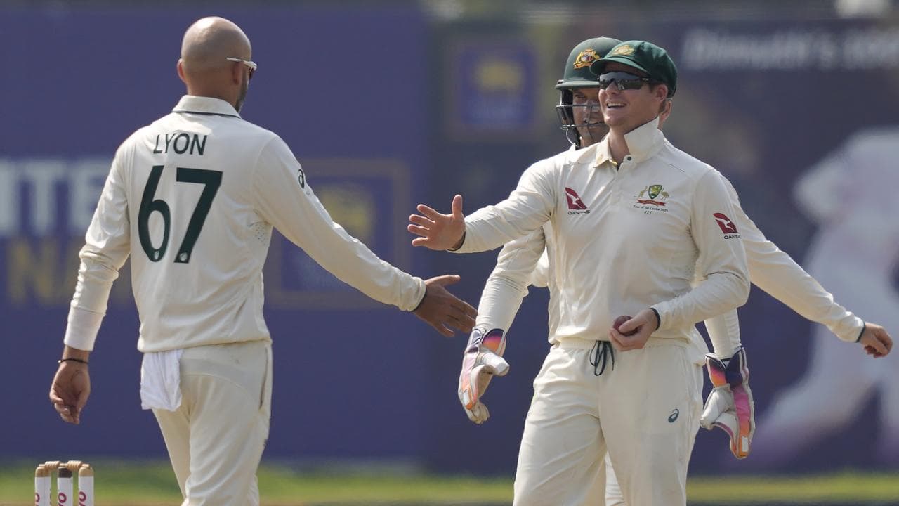 Nathan Lyon and Steve Smith.