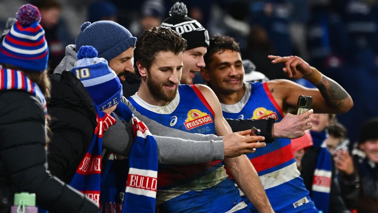 Marcus Bontempelli and Jamarra Ugle-Hagan mingle with fans.