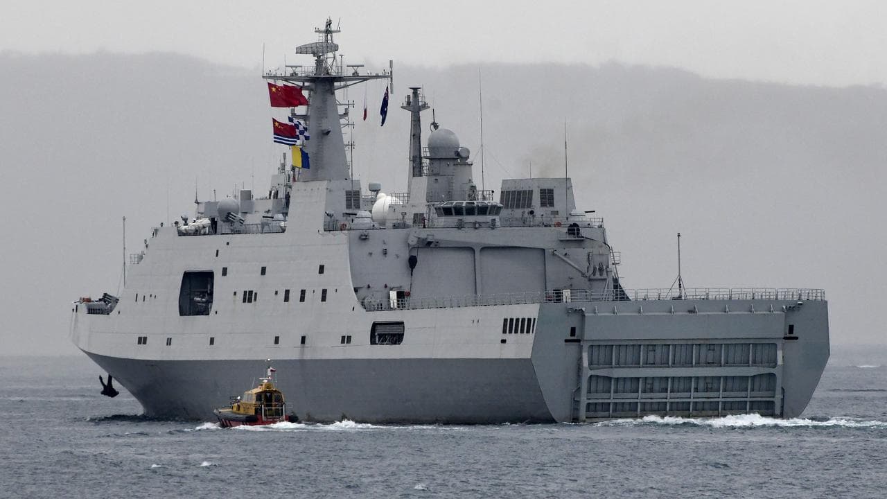 A Chinese Navel ship departs Sydney Harbour