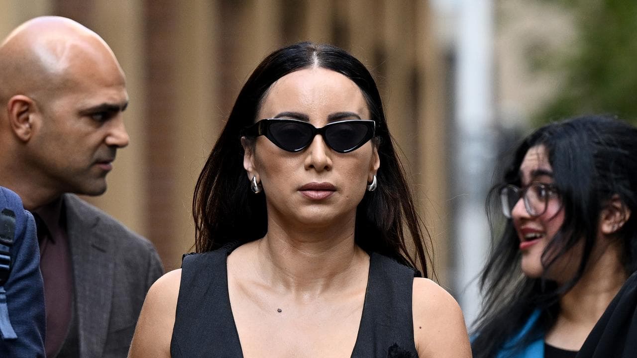 Journalist Antoinette Lattouf (centre)