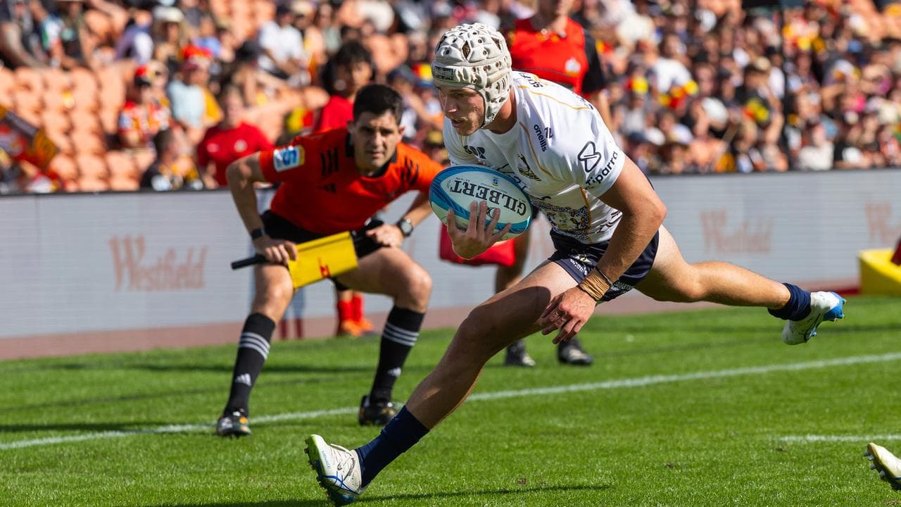 Declan Meredith scores in the corner for the Brumbies.