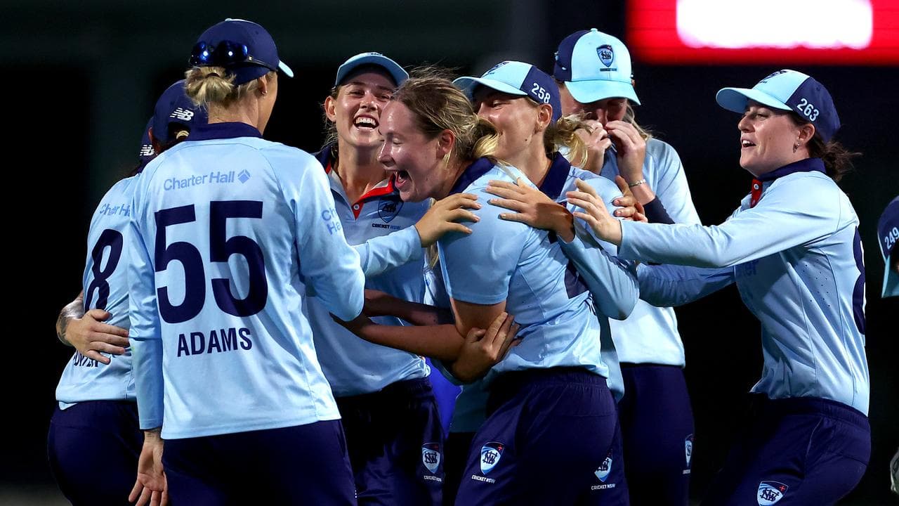 Teammates congratulate Lauren Cheatle