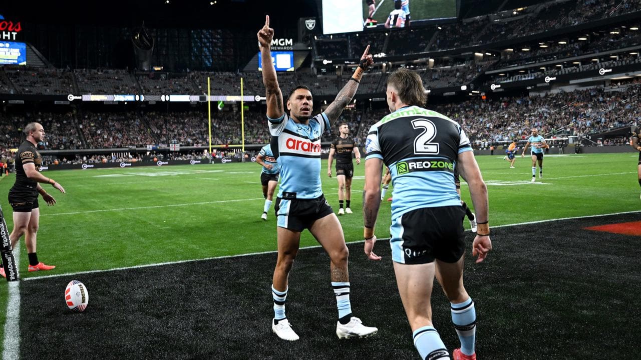 Celebrating Cronulla players.