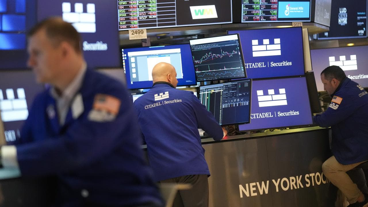 People working at the New York Stock Exchange (file image)