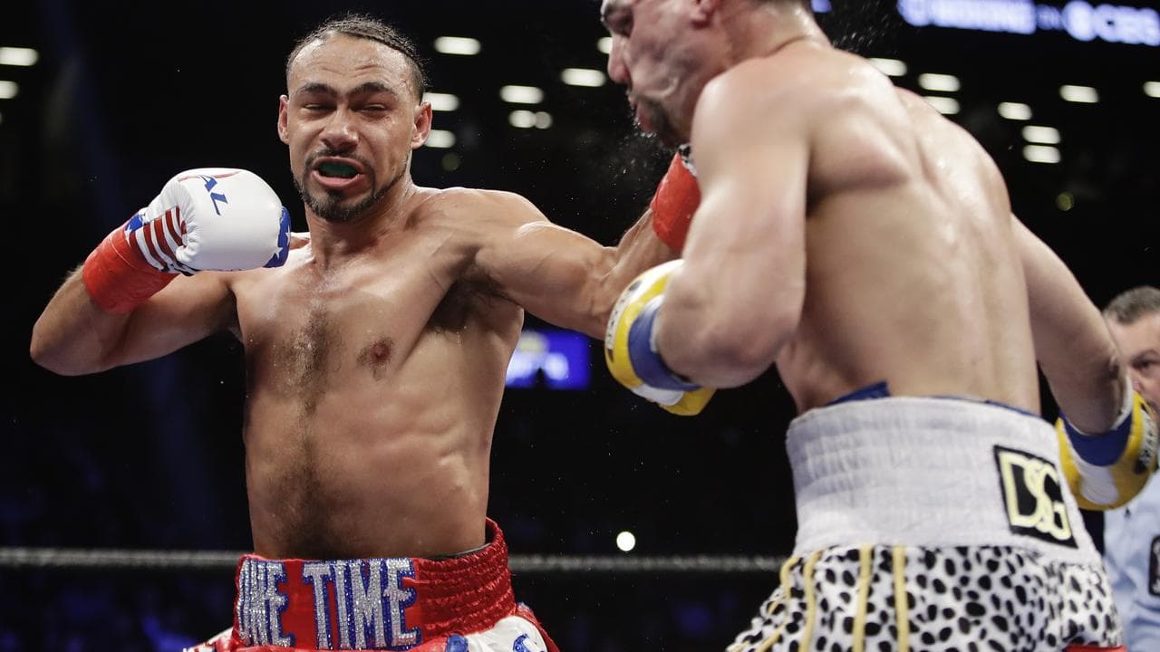 Keith Thurman (left)