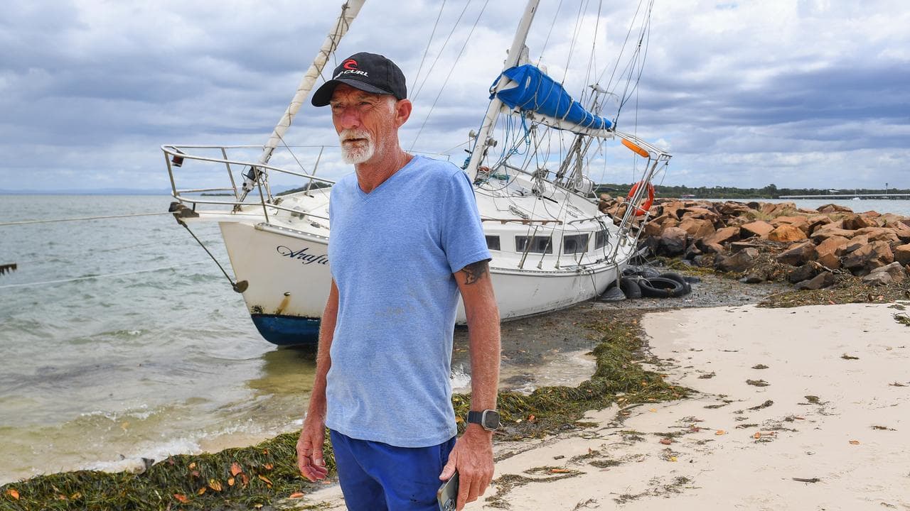 Paul Wright with his beached yacht