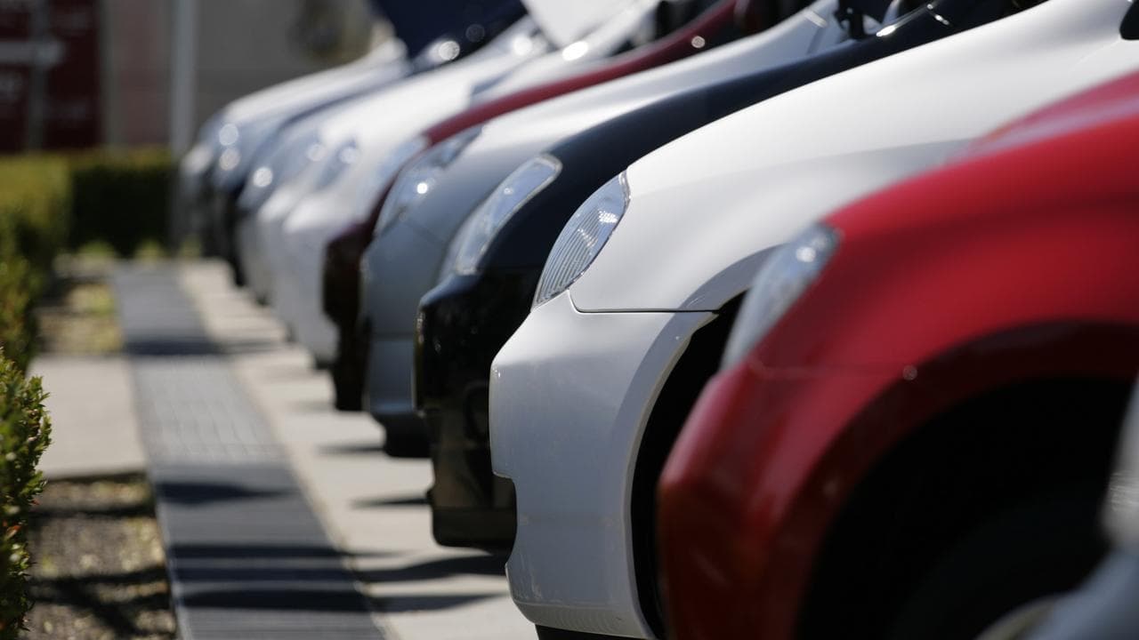 Vehicles lined up at a dealership