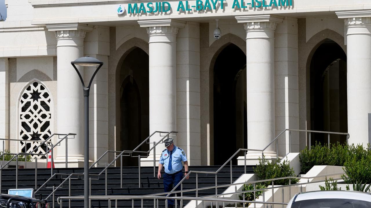 Police at the Australian Islamic House Masjid in Edmondson Park