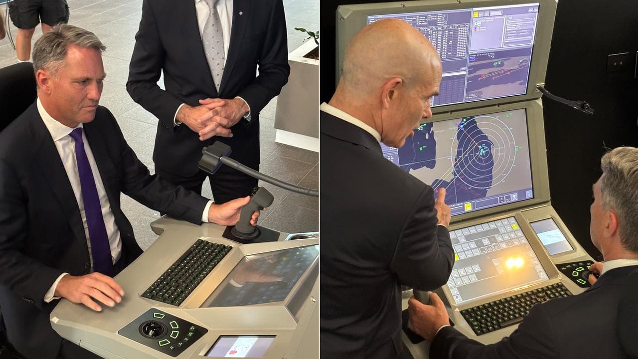 Defence Minister Richard Marles is shown a multifunction console