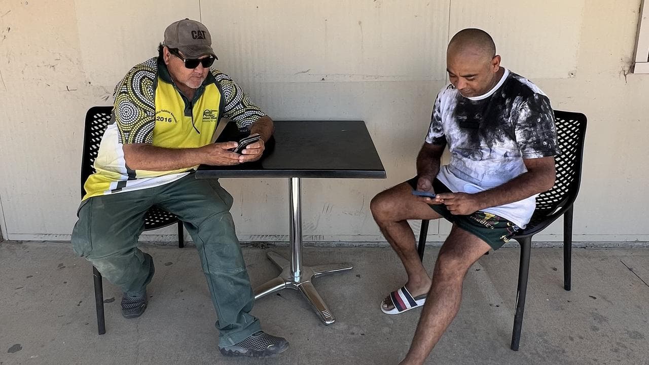 People access wi-fi in an outback town.