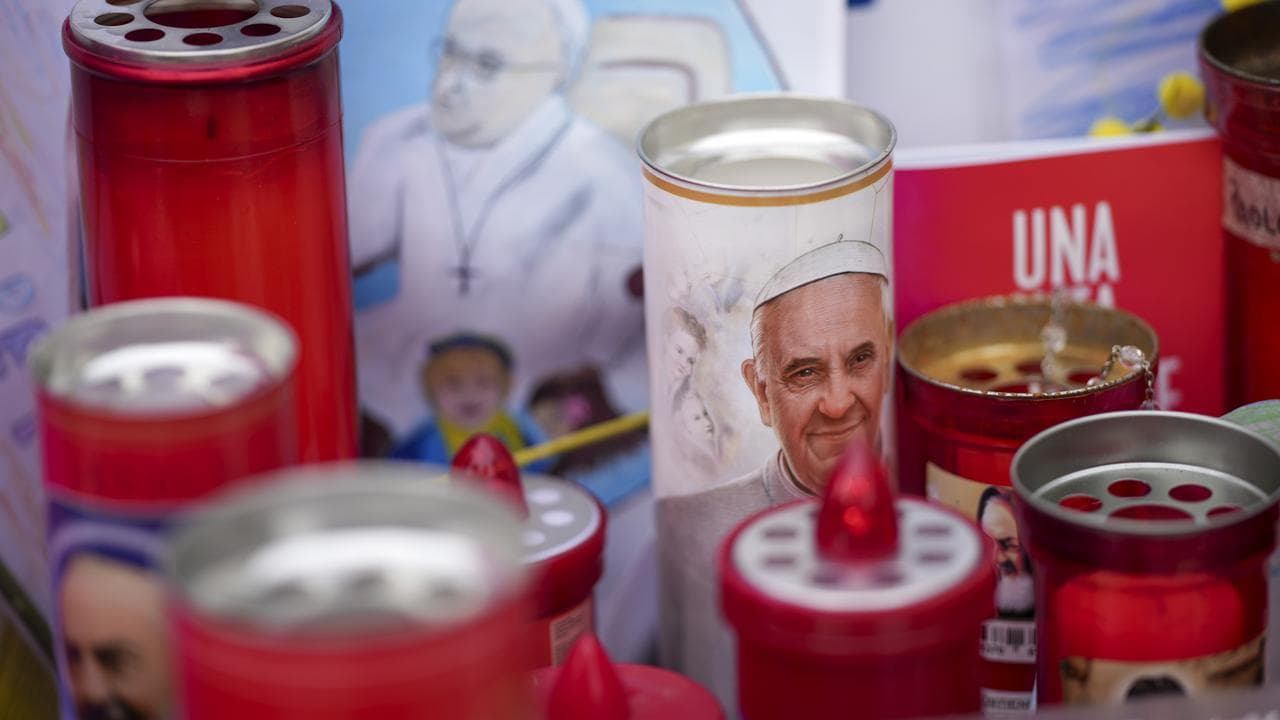 Candles for Pope Francis in front of the Agostino Gemelli Polyclinic