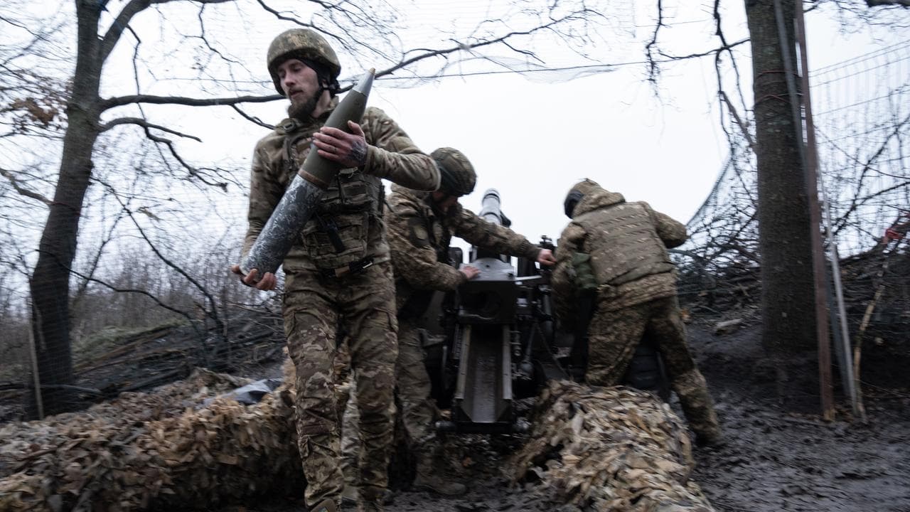 Ukrainian soldiers in combat in the Kharkiv region.