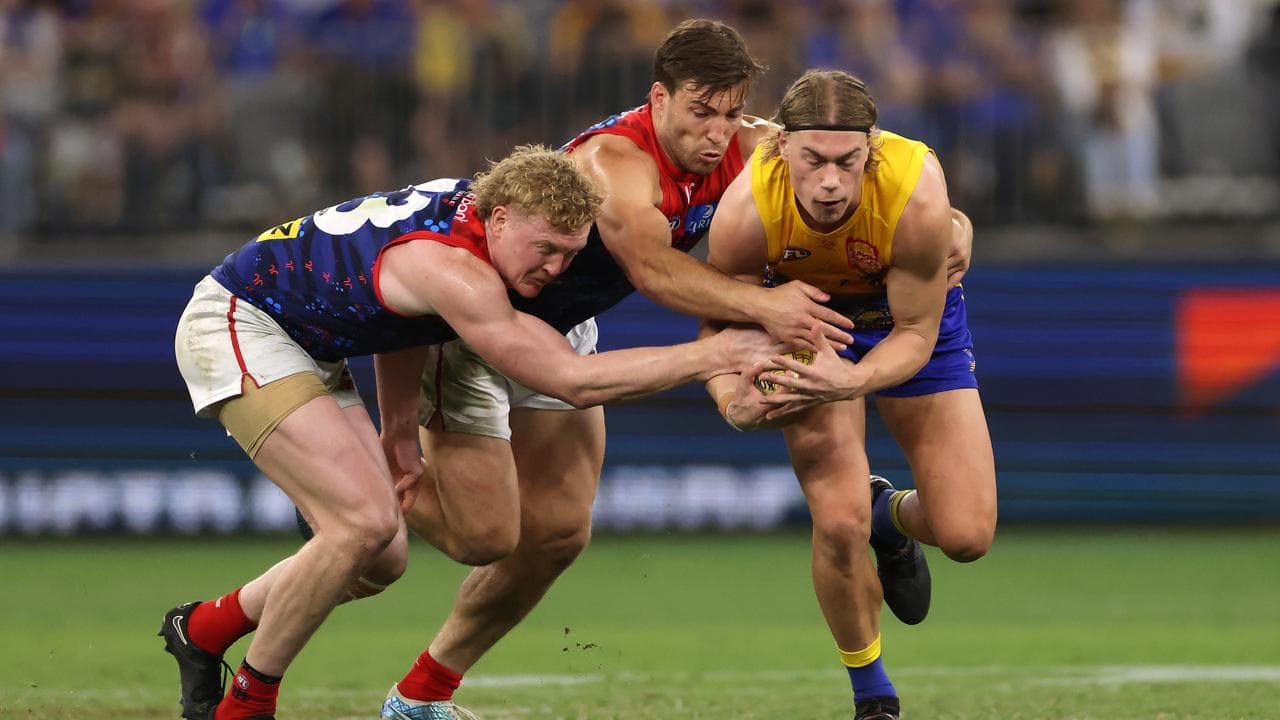Jack Viney (centre) can't wait to join forces with Clayton Oliver 