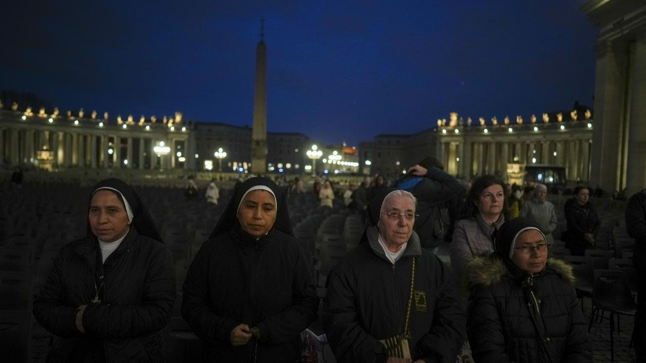 Nuns attend a rosary prayer for Pope Francis, in St Peter's Square