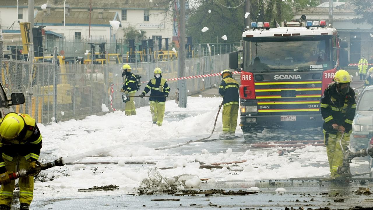 Fire crews spray foam (file image)