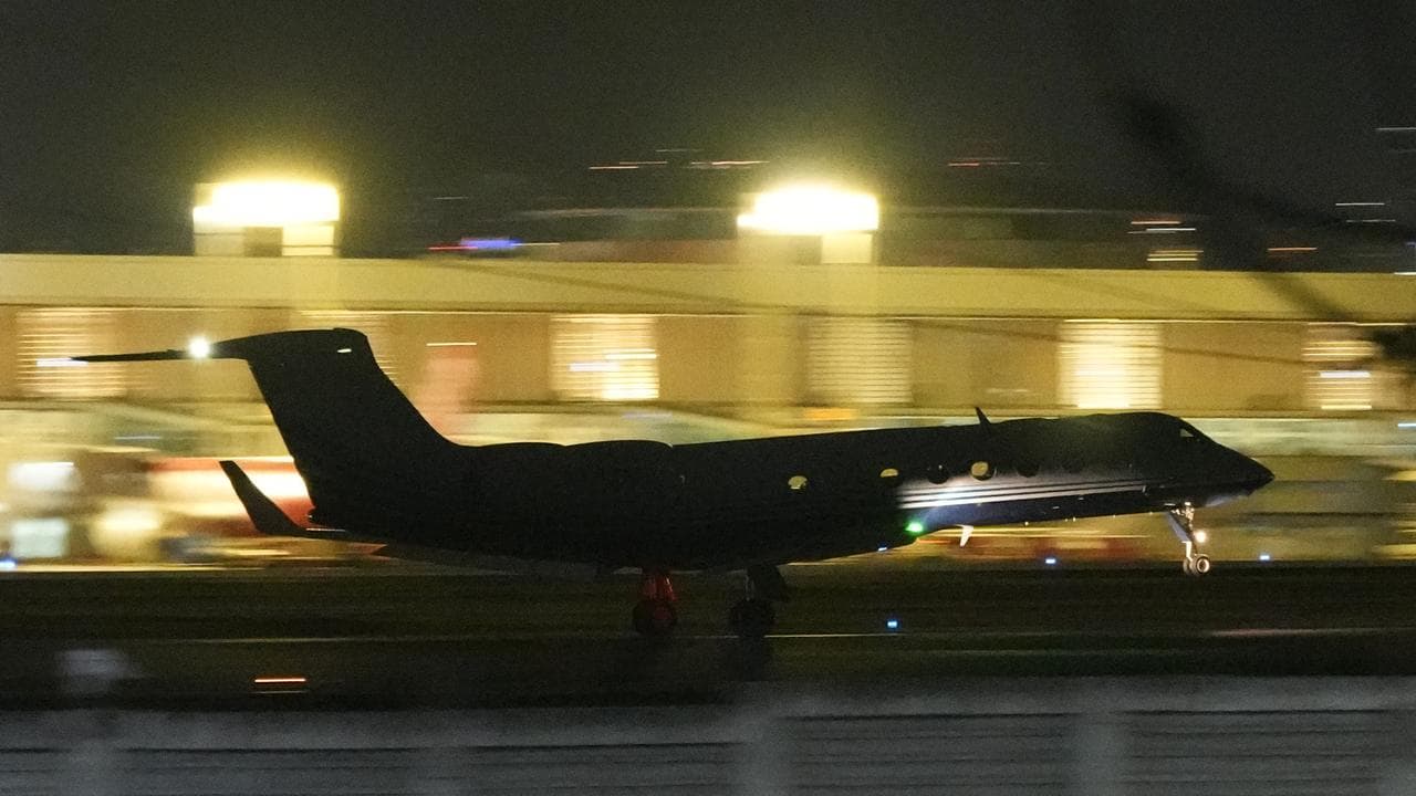 A plane carrying former president Rodrigo Duterte takes off in Manila