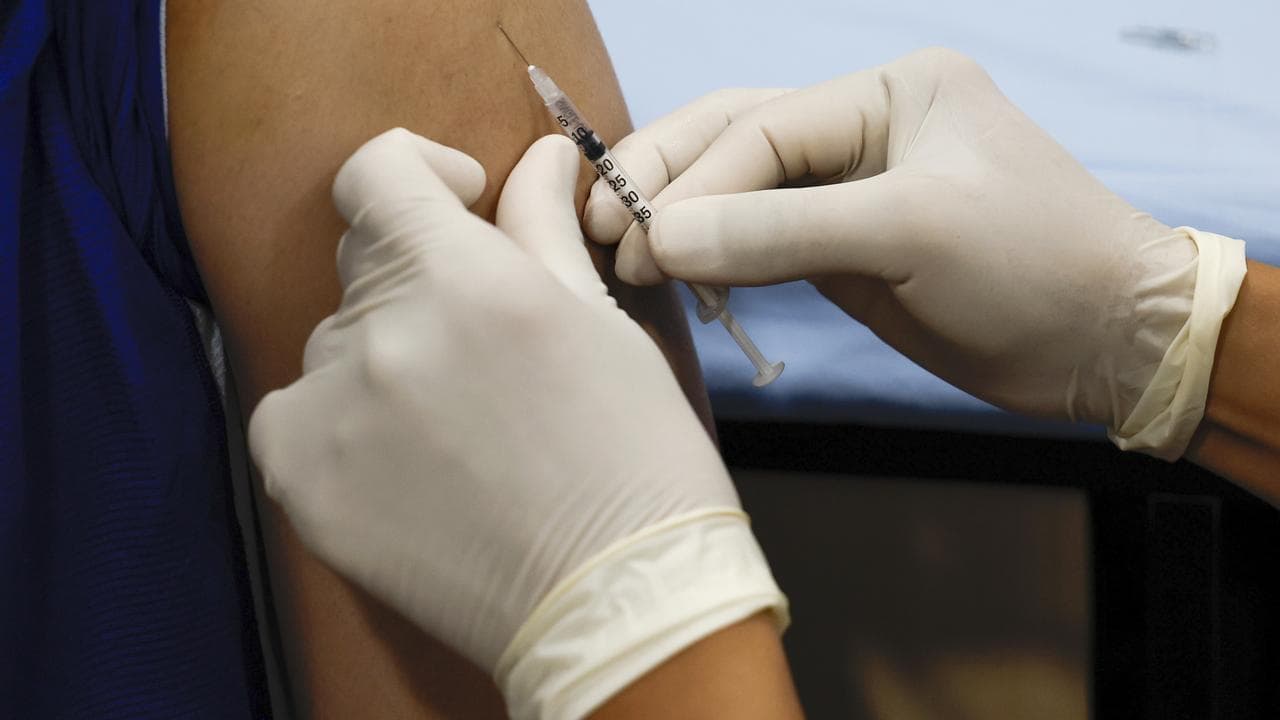 A patient receiving a vaccination.