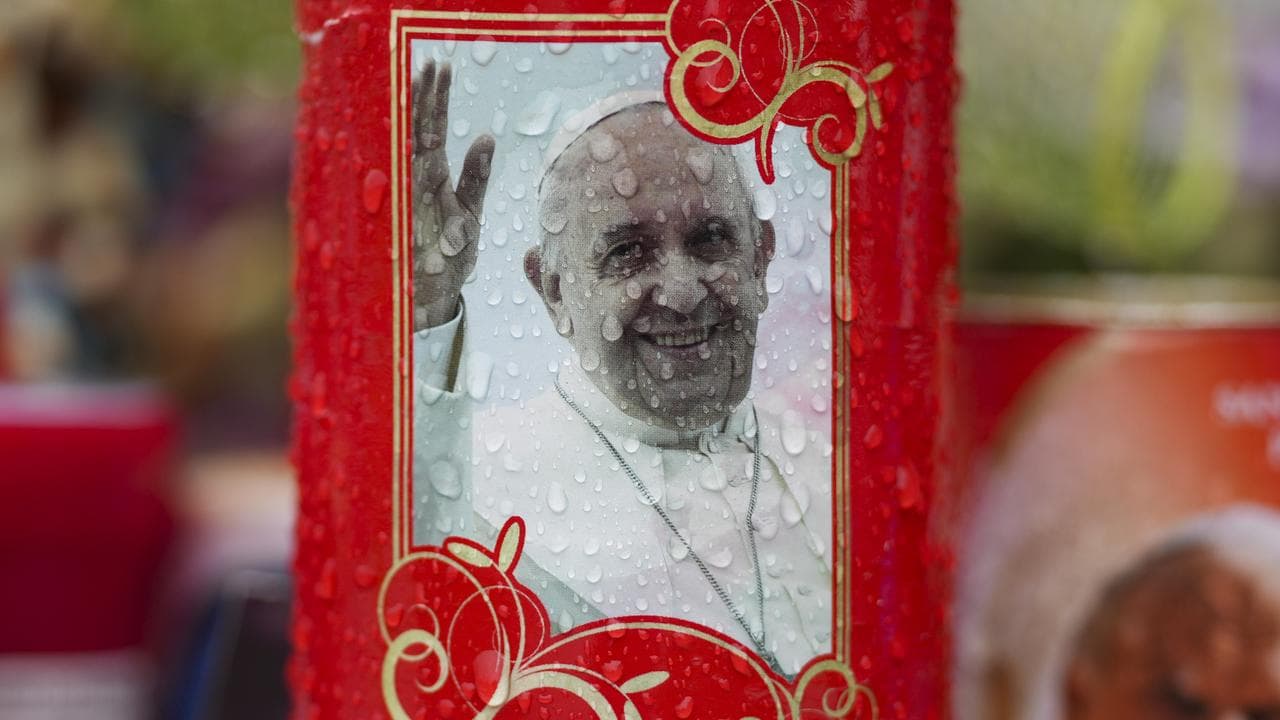 A candle for Pope Francis in front of the Agostino Gemelli Polyclinic
