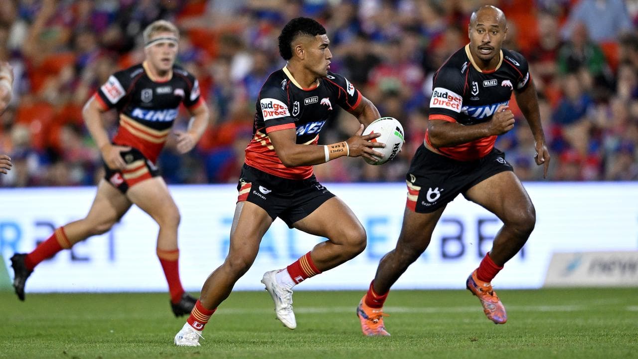 The Dolphins' Isaiya Katoa (centre)
