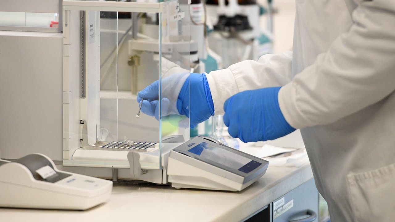 Someone making drugs in a lab