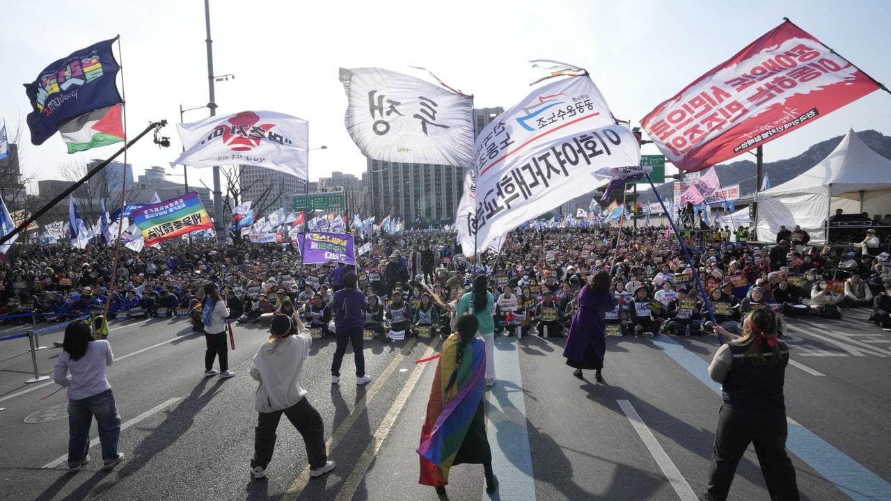 Protesters stage a rally