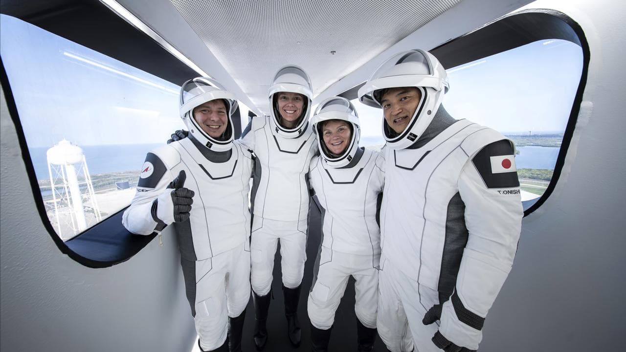 four astronauts completing a countdown dress rehearsal on March 9