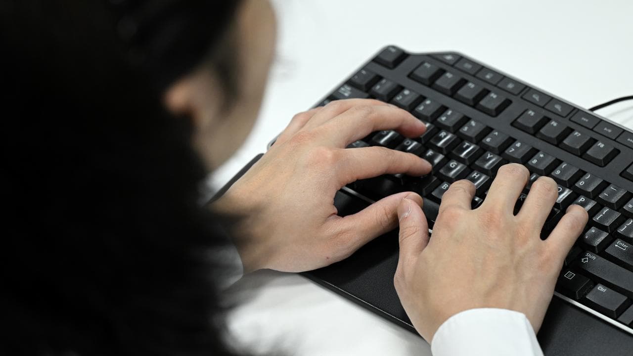 A woman typing on a keyboard (file image)