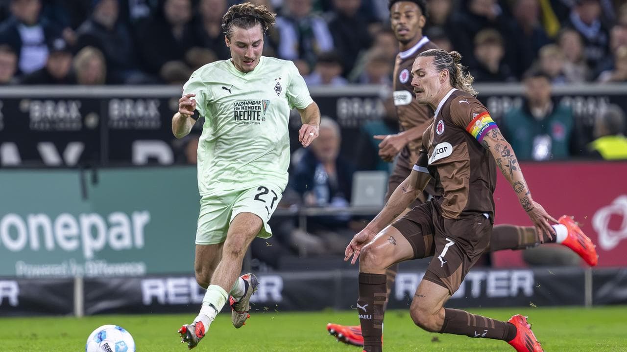 (L-R) Rocco Reitz and Jackson Irvine.