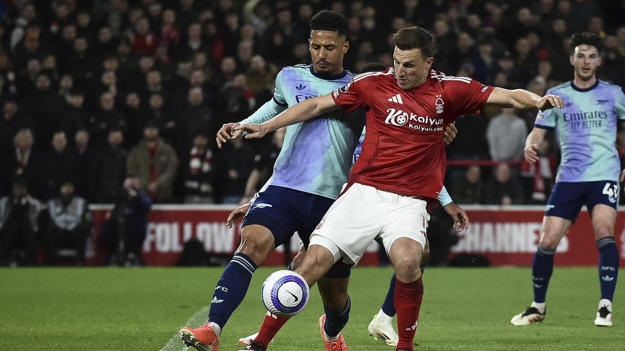 (L-R) William Saliba and Chris Wood.