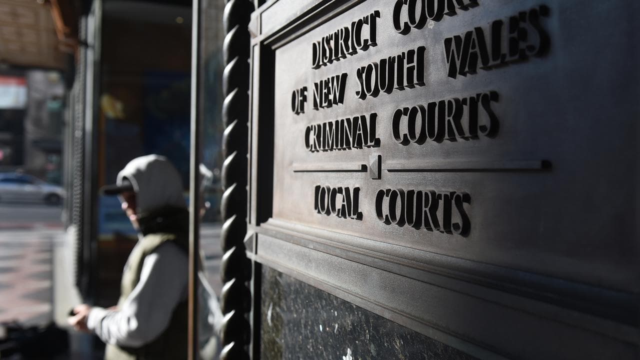 Young person leaves court (file)