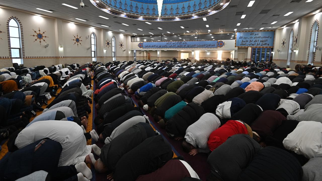Worshippers participate in Eid al-Fitr prayers