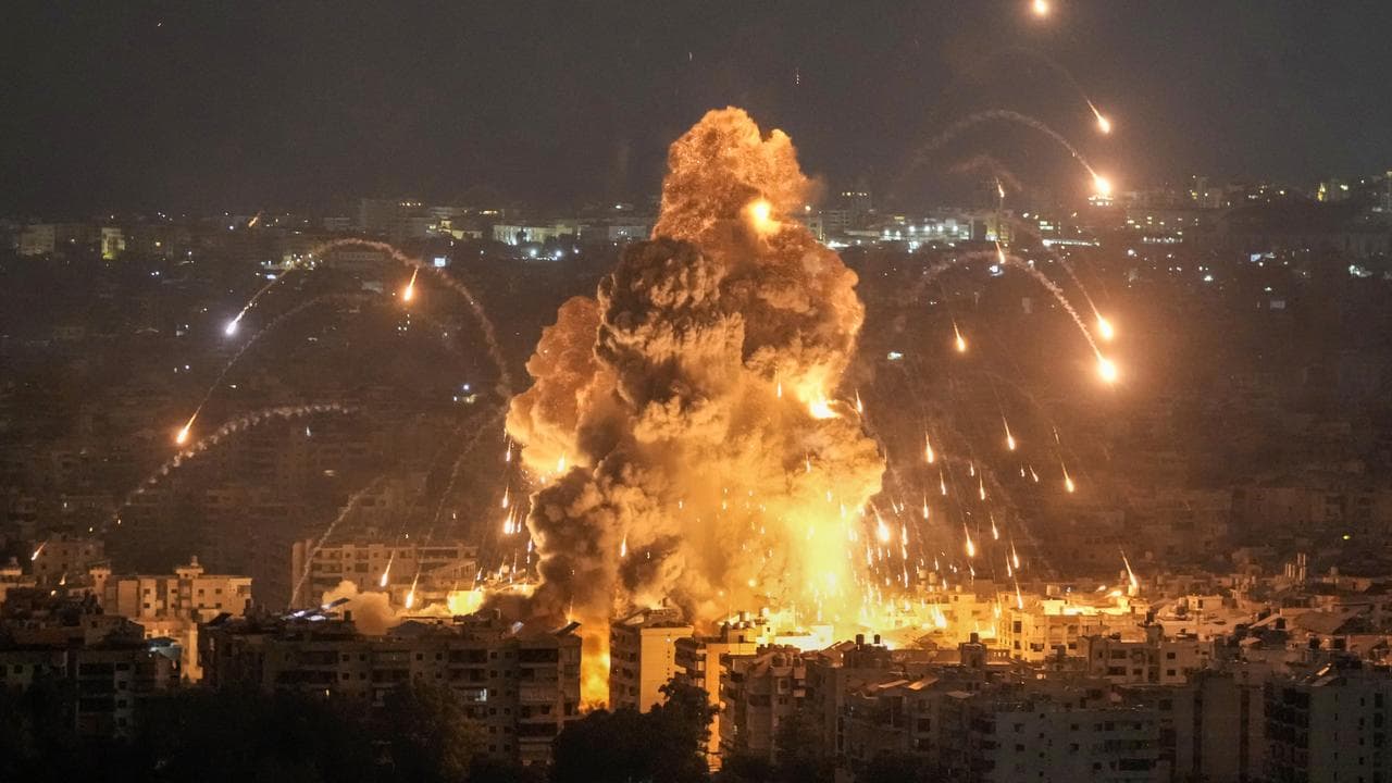 Flames and smoke from an Israeli air strike in Dahiyeh, Beirut