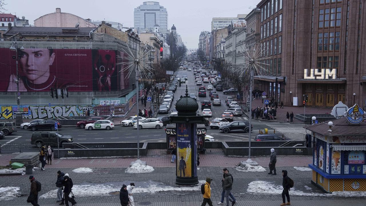 People walk on Khreschatyk street in Kyiv