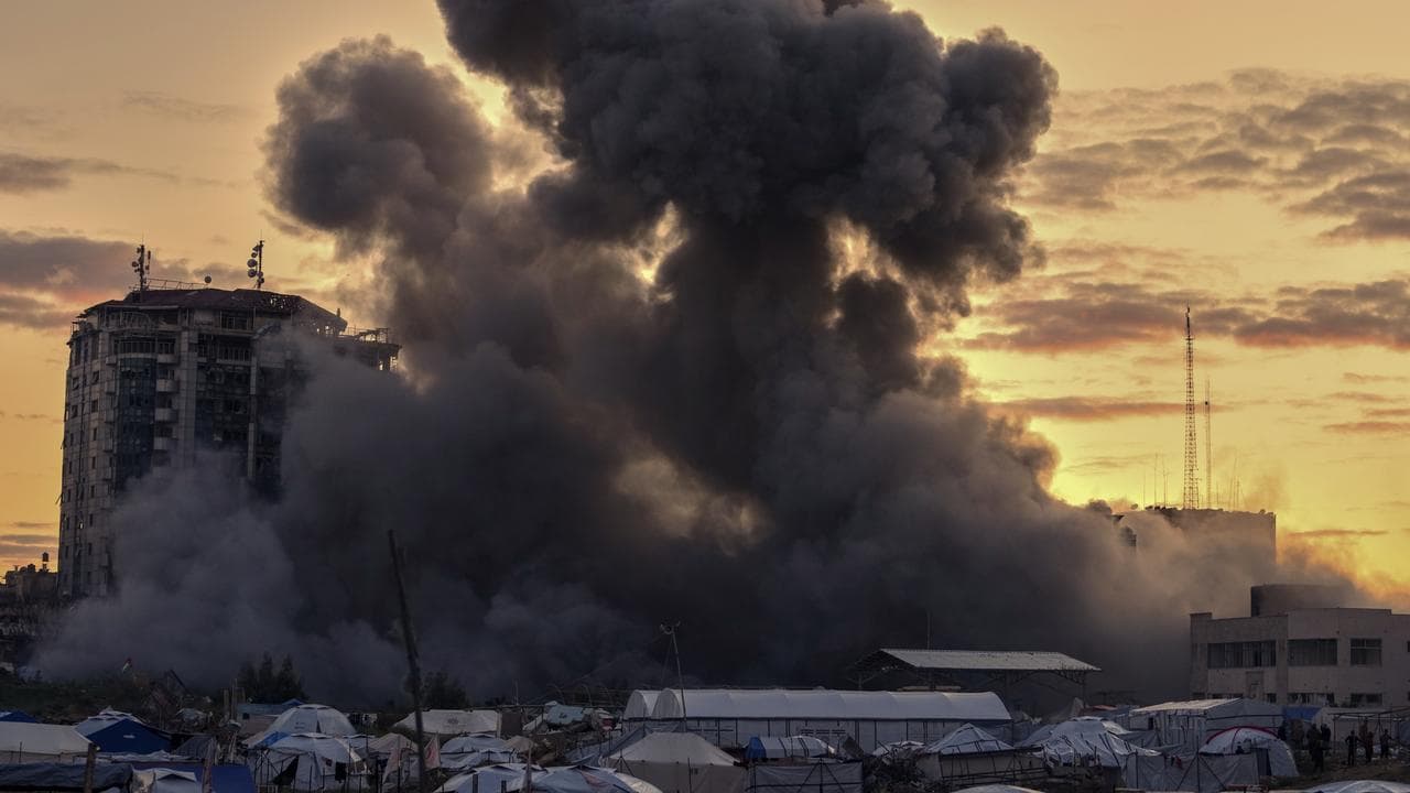Smoke rises from a building after an Israeli army strike