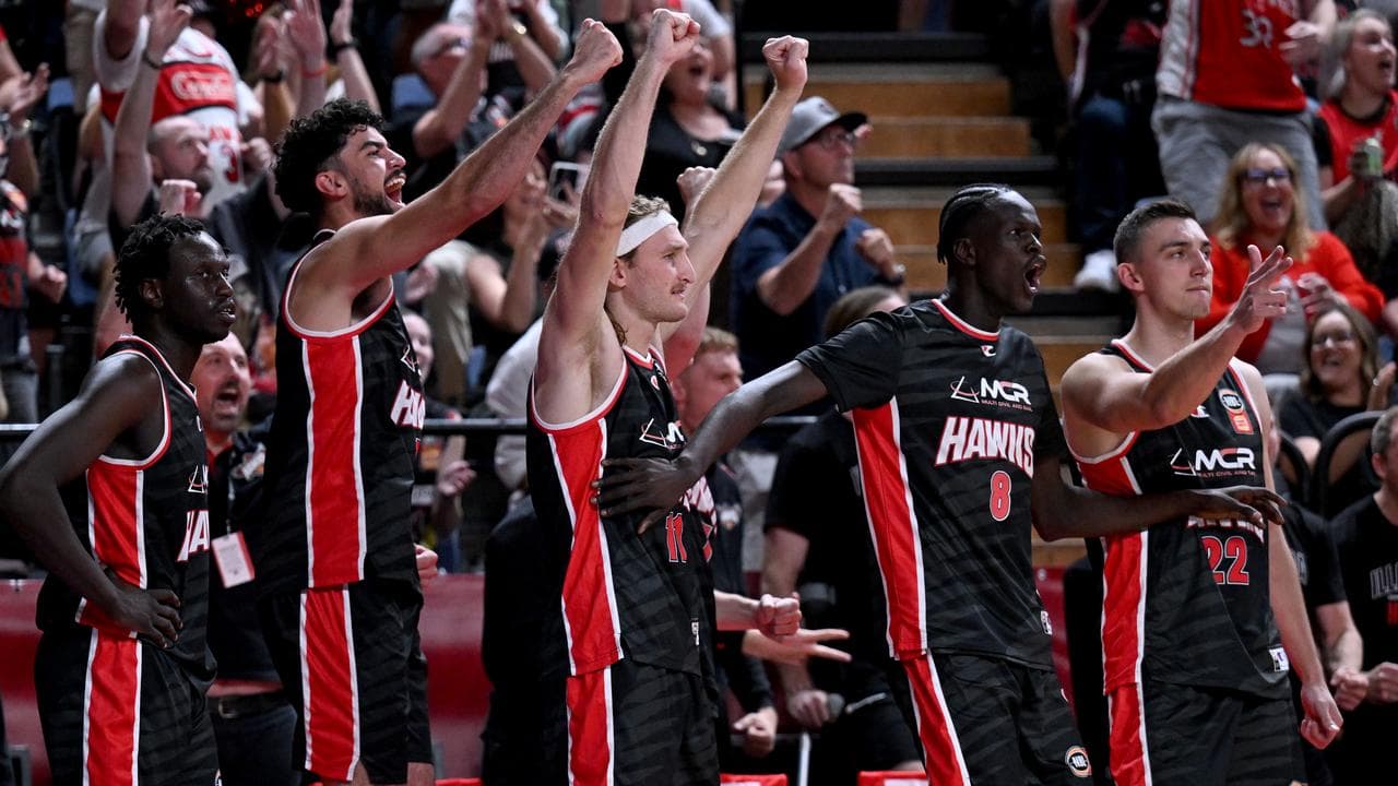 Illawarra players celebrate.