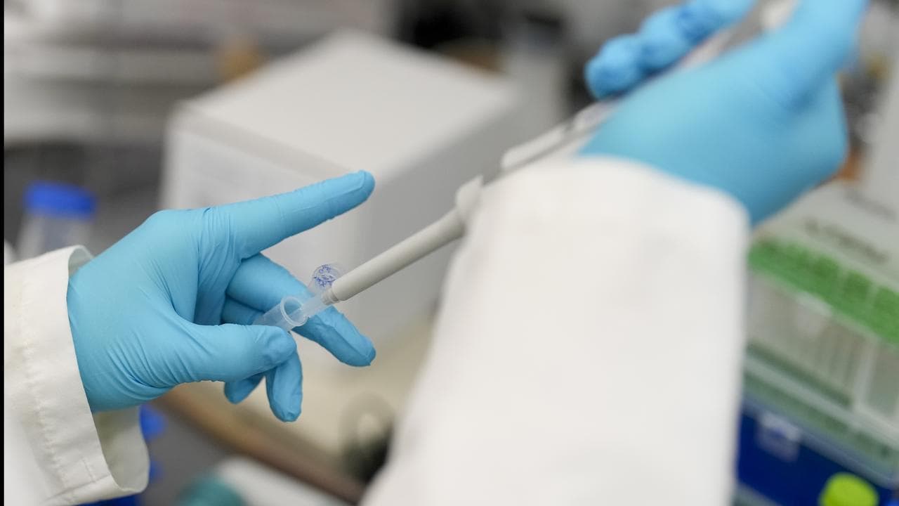 A researcher at work at a cancer lab.