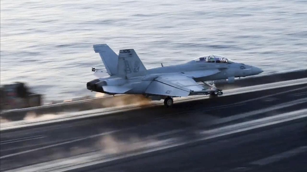 A jet launching from a US carrier before airstrikes in Sanaa, Yemen