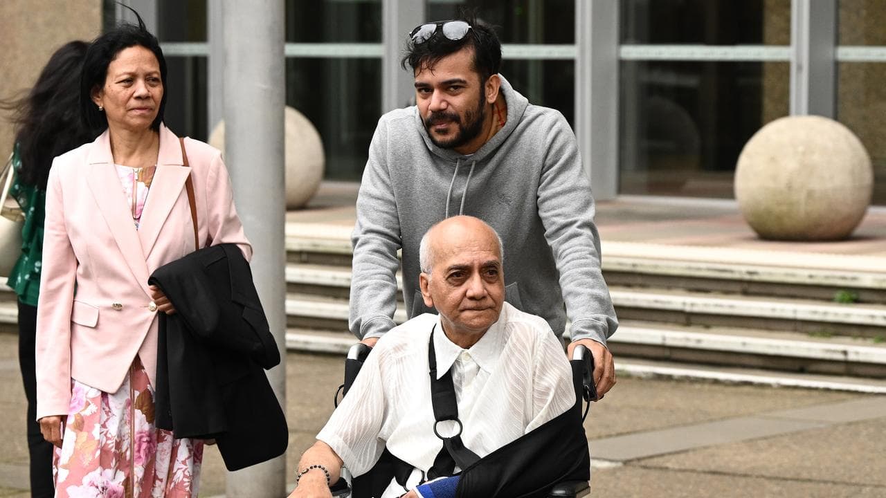 Joao Campos in wheelchair and Artur Campos