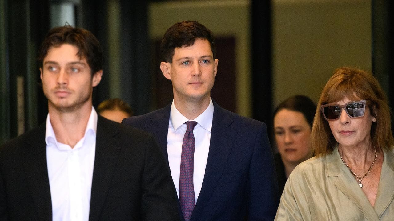 Former NSW Liberal MP Roderick Gilmore Amon (centre)