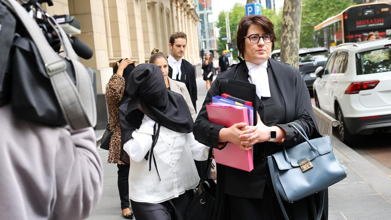 Barrister Karen Argiropoulos leaving court with family members