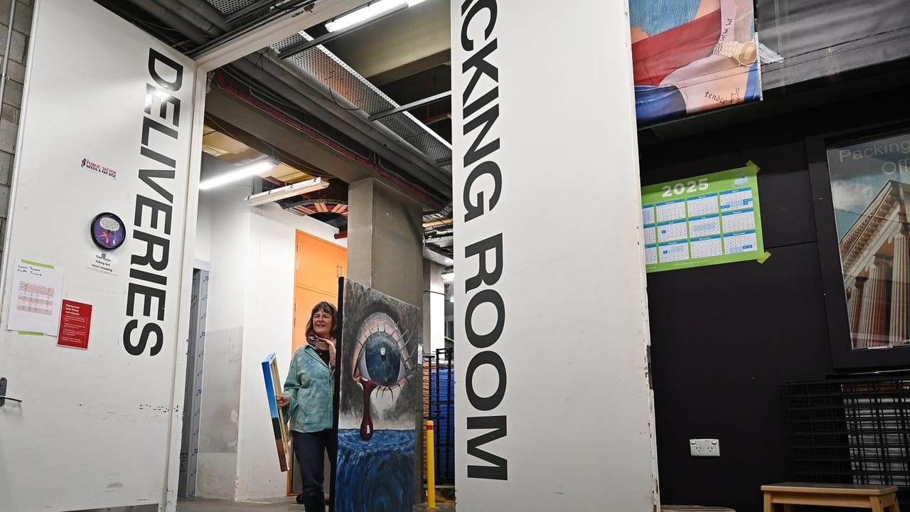 An artist delivers their artwork