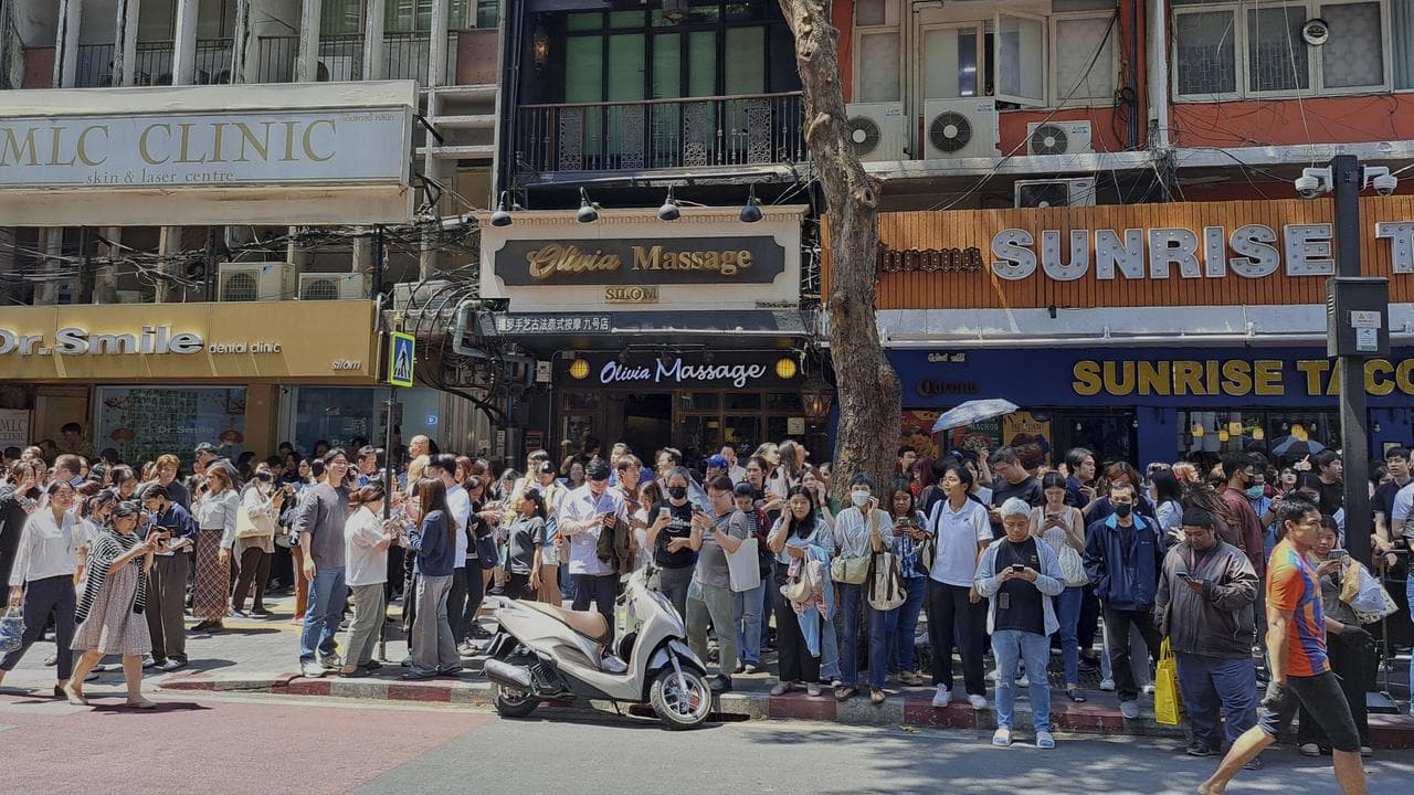 People who fled buildings following earthquake in Bangkok, Thailand