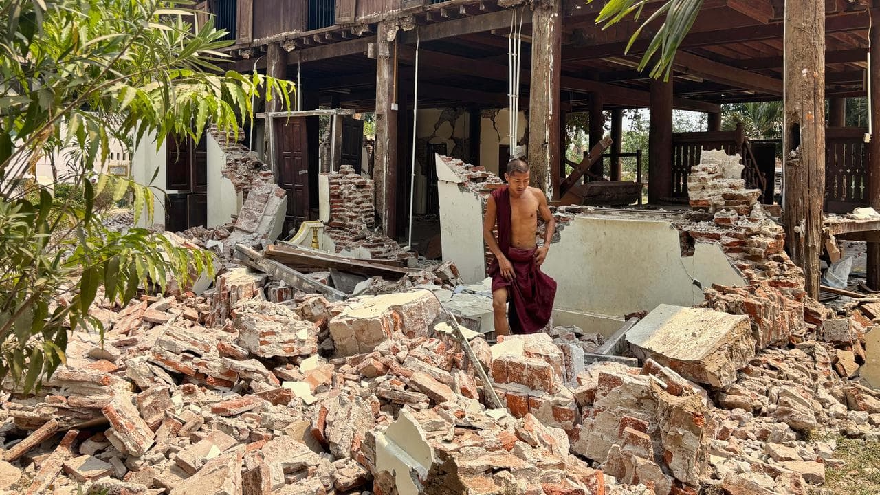 Buddhist monk at a damaged monastery compound in Naypyitaw, Myanmar