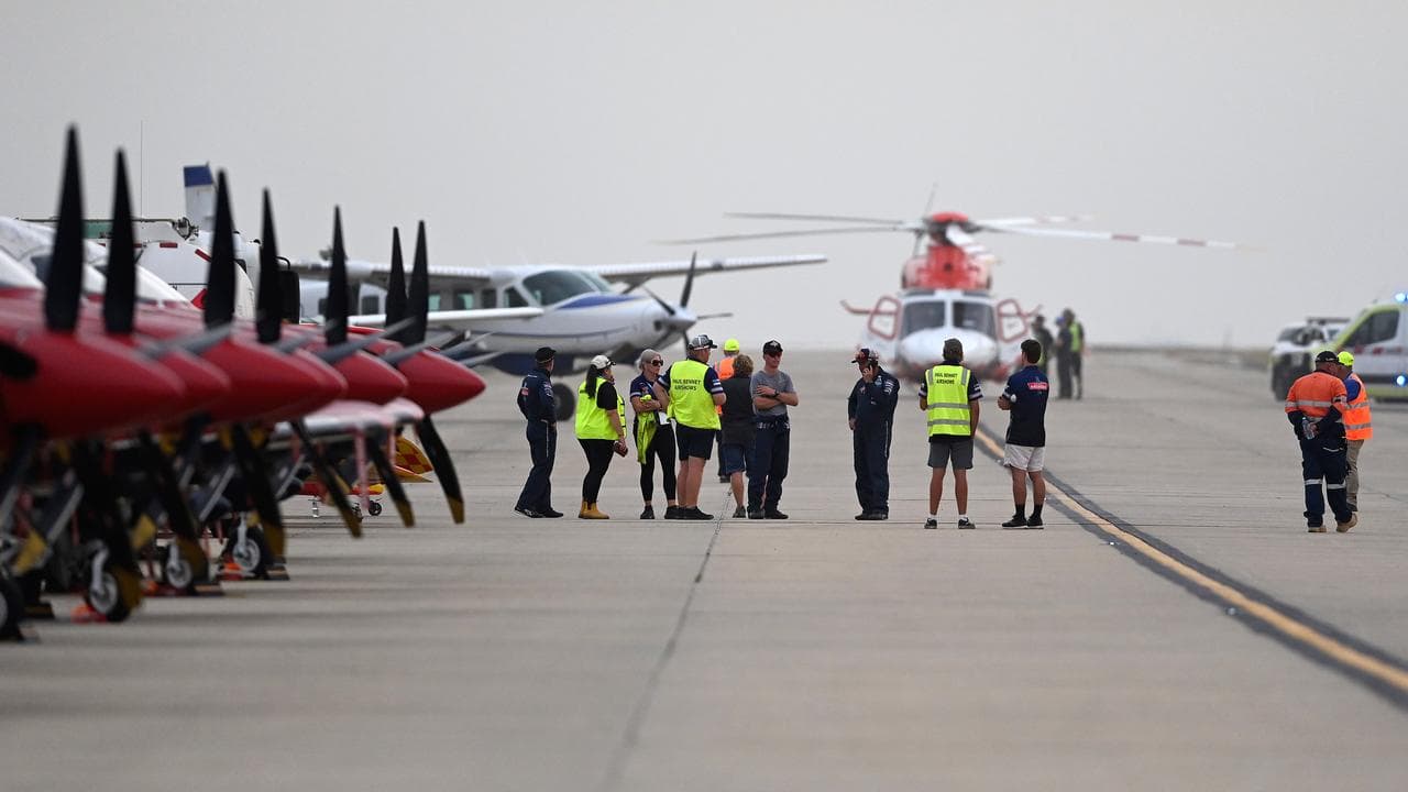 People on tarmac in aftermath of plane crash